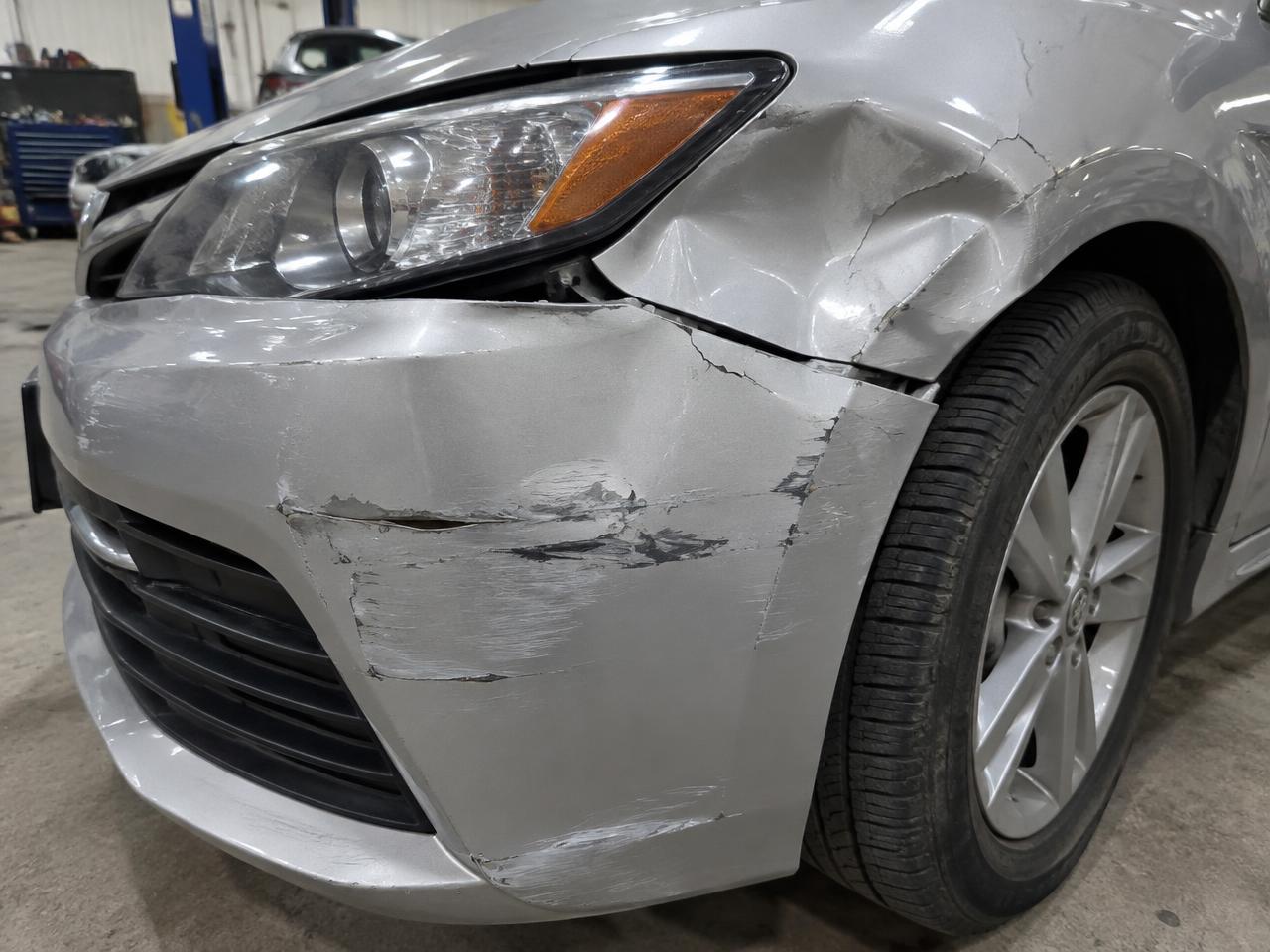 Before: front bumper and fender repair